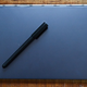 Then pen is included, as are real pen inserts. Yes you will accidentally draw all over the keyboard at least once.